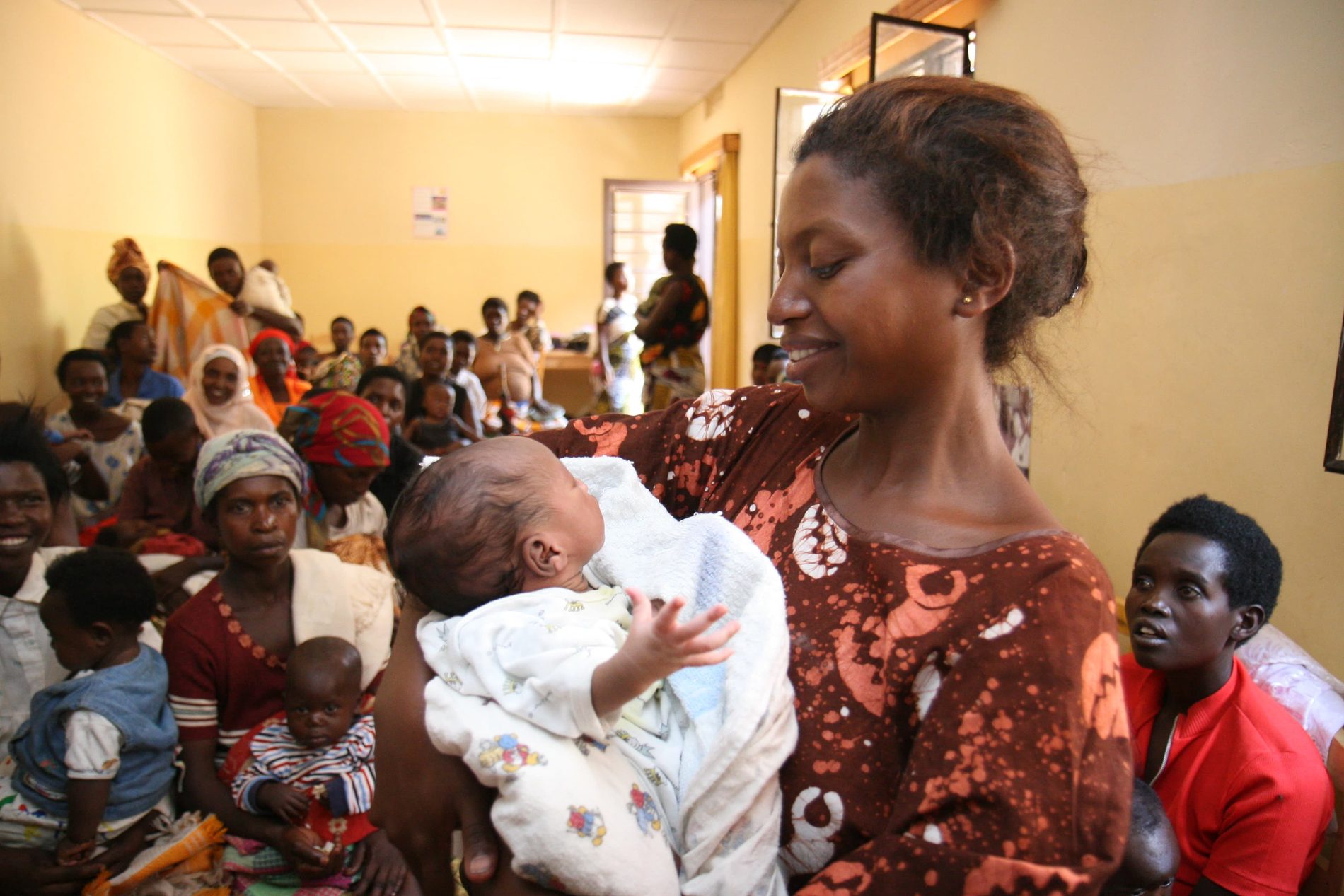A crowded clinic waiting room in Rwanda.